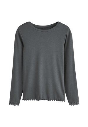 Šedé dlouhé rukávy tričko s ribbed texturou, s vroubkovaným lemem a krajkovými detaily na manžetách. Design s kulatým výstřihem a uvolněným střihem.