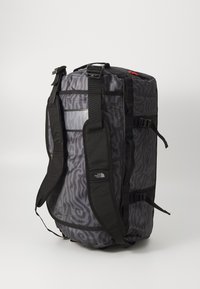 The North Face BASE CAMP DUFFEL S UNISEX - Valigia - black/tiger stripe
