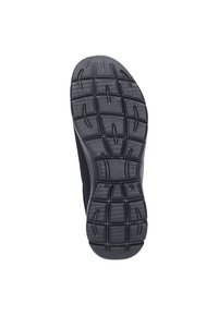 Svart gummisula med ett texturerat mönster för grepp, med förstärkta kanter och ett slätt centralt område för hållbarhet.