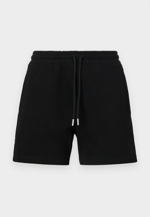 Svart bomullsshorts med elastisk midje med snøring, sidelommer og en klassisk, avslappet passform. Jevn tekstur uten mønstre.