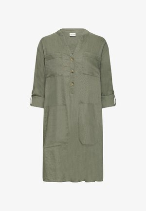 Tunic verde oliva con scollatura a V, maniche a tre quarti, chiusura con bottoni, due tasche sul petto e una consistenza morbida e leggera.