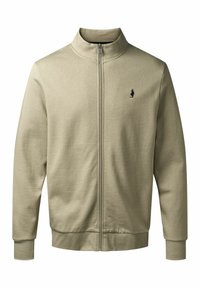 Lys beige zip-jakke med høj krave, ribbede manchetter og kant, med et lille mørkt logo på venstre bryst. Glat tekstur.