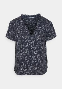 Blusa navy a maniche corte con scollatura a V, caratterizzata da un motivo geometrico bianco sparso e un collo arricciato. Tessuto leggero.