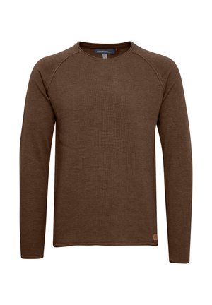 Brązowa, długorękawowa koszulka z okrągłym dekoltem, wykonana z prążkowanego materiału. Posiada rękawy raglanowe oraz małą skórzaną metkę na dolnej stronie.