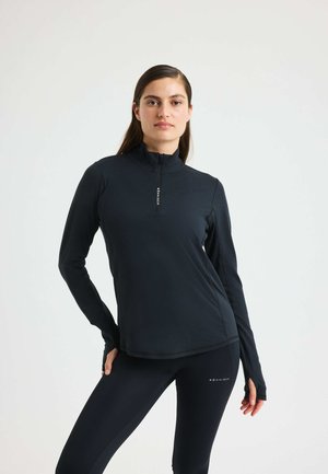 Schwarzes sportliches Langarmoberteil mit hohem Kragen und halbem Reißverschluss, ausgestattet mit einer glatten Textur und einem Logo-Detail auf der Vorderseite.