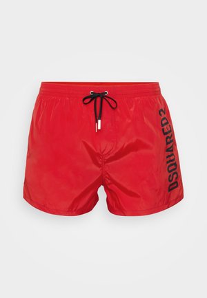 Piros úszónadrág könnyű anyagból, fekete zsinórral és oldalt fekete felirattal, ami "DSQUARED2". Rugalmas derékpánt a kényelem érdekében.