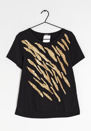 Zwart T-shirt met korte mouwen en een abstract patroon van gouden pailletten aan de voorkant. Ronde halslijn en een ontspannen pasvorm.