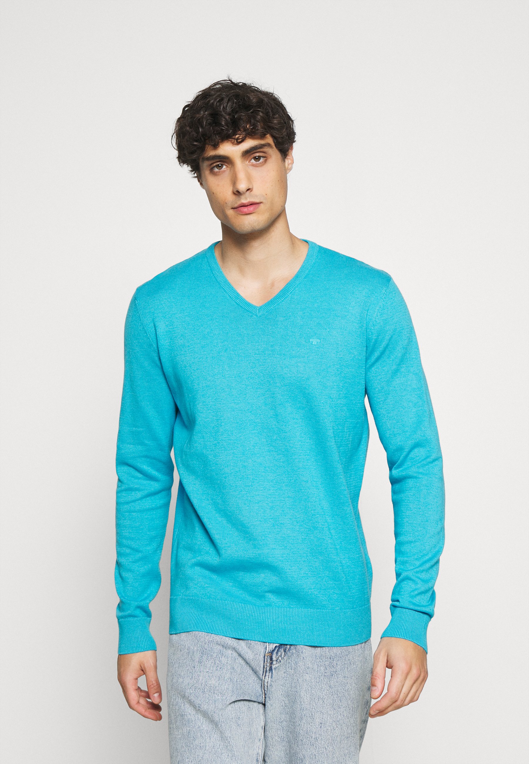 bright teal sweater