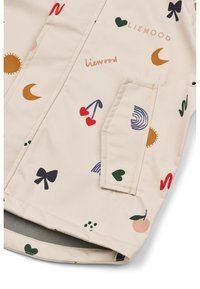 Bež dežni plašč z različnimi pisanimi vzorci, vključno s soncem, češnjami, srčki, pentljami in valovi. Opremljen z bočnim žepom.