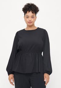 Black peplum top in lightweight fabric, featuring long puffed sleeves and a round neckline, with gathered detail at the waist.