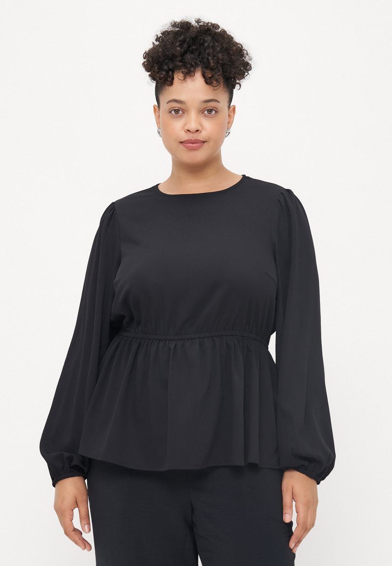 Black peplum top in lightweight fabric, featuring long puffed sleeves and a round neckline, with gathered detail at the waist.
