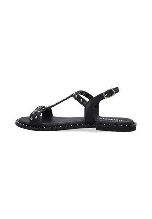 Zwarte sandaal met studded accenten, verstelbare band, open teenontwerp, platte zool, gemaakt van leren materiaal en versierd met zilveren studs.