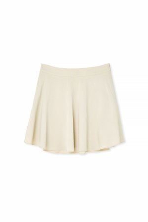 Svijetlosmeđa suknja na špici sa glatkom teksturom i elastičnom strukom. Dizajnirana je s jednostavnim, klasičnim oblikom i bez vidljivih uzoraka.