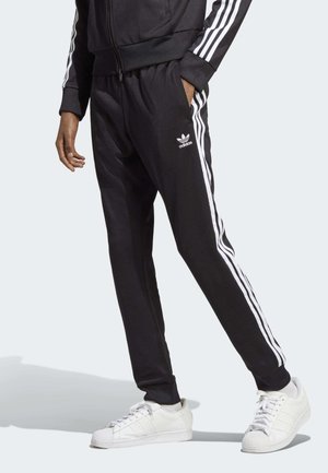 adidas Originals CHALLENGER - Pantalones deportivos - black/negro Zalando.es