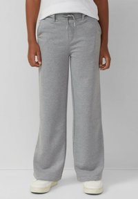 Grijze joggingbroek van zacht materiaal, wijdvallend ontwerp, elastische tailleband met trekkoord, met twee zijzakken en een relaxte pasvorm.