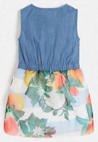 Denim korsettjurk met een elastische tailleband. De rok heeft een doorschijnende, bloemenprint overlay met levendige kleuren en groene bladeren.