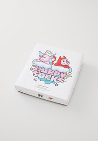 White gift box featuring cartoon pigs, one with a halo and the other with horns, surrounded by clouds and lightning accents. "HAPPY SOCKS" printed prominently.