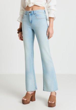 LUNGO TINTA UNITA - Jean flare - blu denim chiaro
