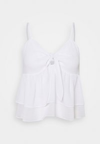 Weißes ärmelloses Oberteil mit gebundenem Vorderteil, geschichteter Rüschendesign und strukturiertem Stoff. Verstellbare Träger und lockere Passform.