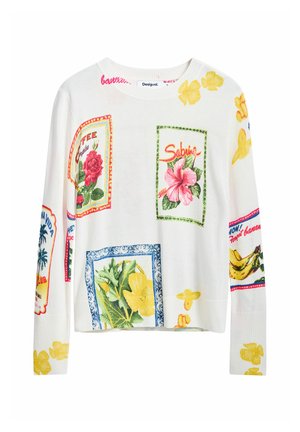 Pull en tricot blanc avec des motifs de cartes postales florales et tropicales colorées, des accents jaunes et des poignets et un ourlet côtelés.