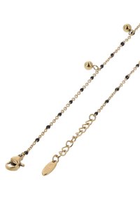 Kultaketju, jossa on mustia helmiä, hummerilukko ja säädettävä pituus, jossa on tarranus brändin tunnistamiseksi.