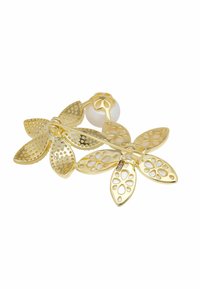 Gold-colored flower brooch featuring textured petals and a central pearl. Each petal has intricate cut-out designs and a polished finish.