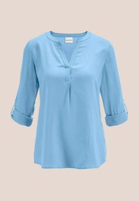 Hellsbluse aus glattem, leichtem Stoff. Mit V-Ausschnitt, Dreiviertelärmeln und aufgerollten Manschetten. Einfaches, elegantes Design.