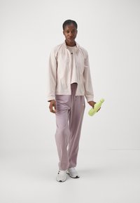 adidas Performance OWN THE RUN - Bodywarmer - putty mauve