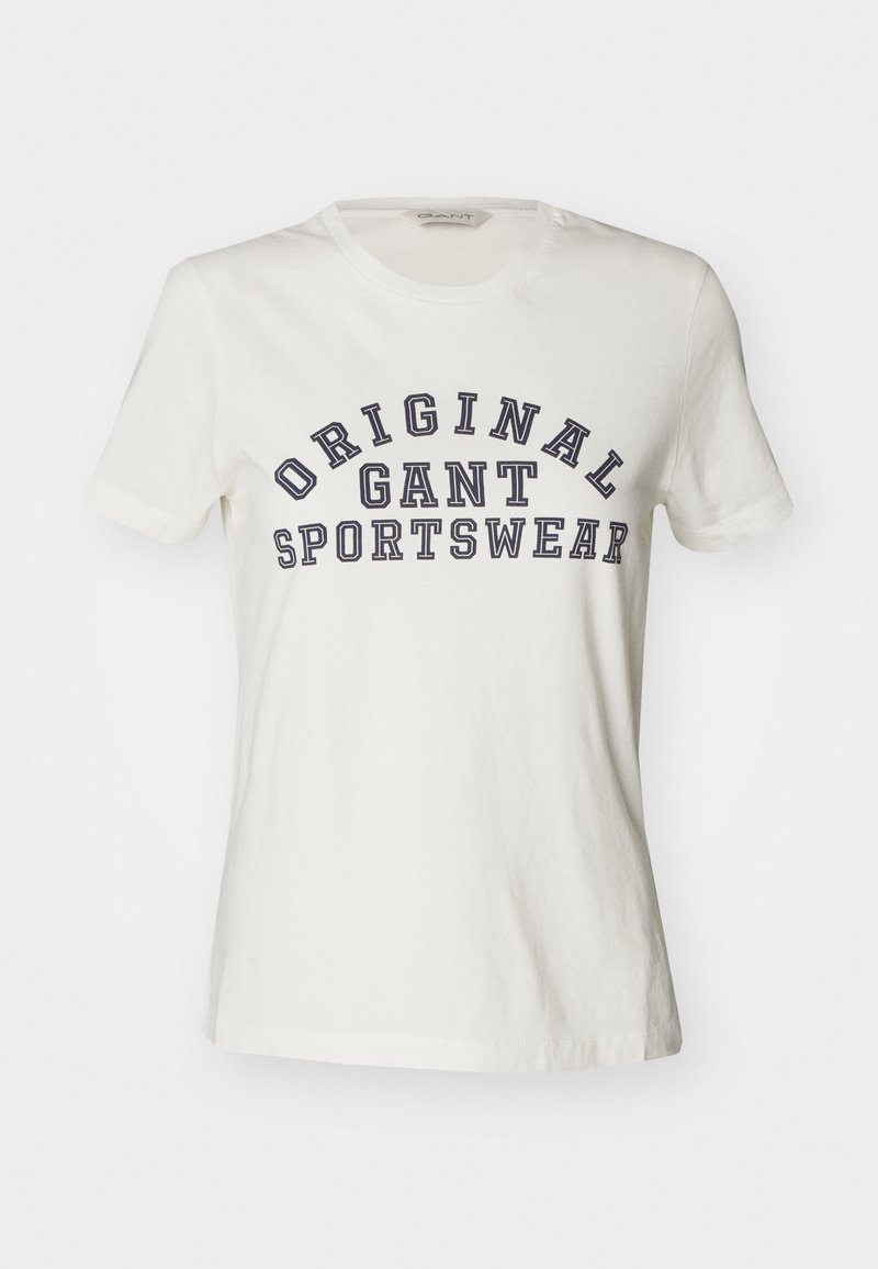 Bílé bavlněné tričko s kulatým výstřihem a krátkými rukávy, zdobené textem "ORIGINAL GANT SPORTSWEAR" v námořnicky modré barvě v zakřiveném designu.