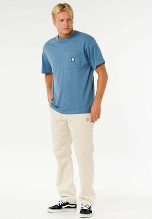 - Spodnie materiałowe