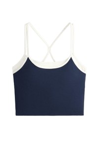 Tengerészkék bordázott crop top fehér szegéllyel és vékony, fehér keresztpántokkal a hátoldalon.