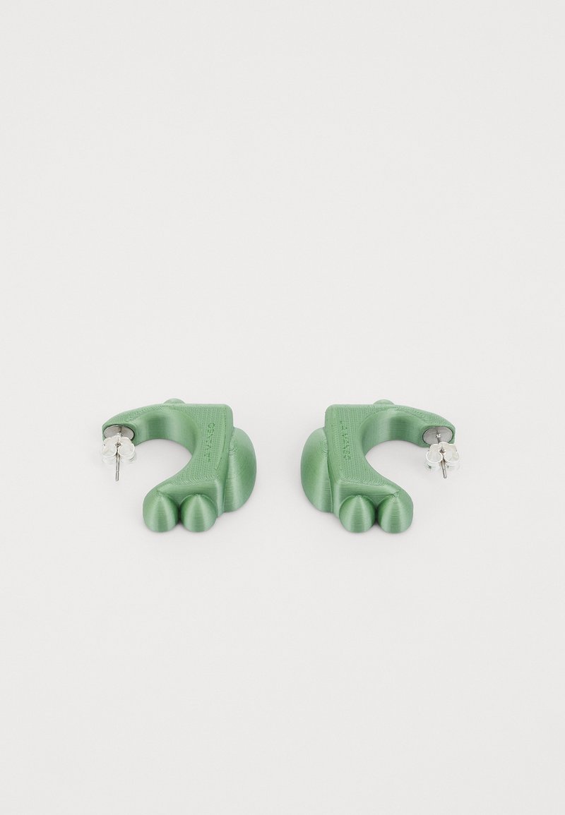 Green earrings shaped like a stylized hand with three rounded fingers. Made of smooth material with a glossy finish and a stud backing.