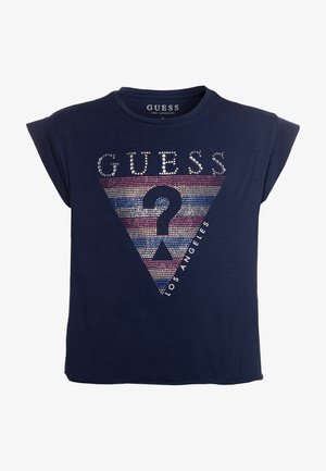 Mørkeblå ærmeløs top med GUESS-logo og flerfarvet rhinsten-trekant med et sort spørgsmålstegn og teksten "Los Angeles".