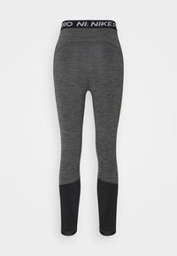 Leggings atletici grigi con una vita nera recante la scritta "NIKE PRO". Le gambe inferiori presentano un pannello nero solido, texture liscia e un design aderente.