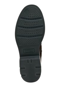 Suela de goma negra con superficie texturizada, que presenta surcos y perforaciones. Marca Geox visible. Diseñada para la ventilación y la comodidad.