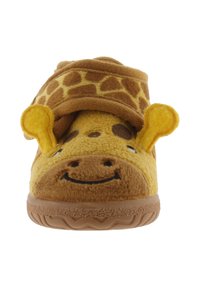 Pantofole a tema giraffa giallo realizzate in morbido materiale plush, con cinturino in velcro, sorriso ricamato e suola in gomma testurizzata per una maggiore aderenza.