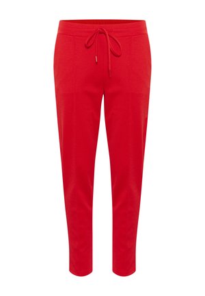 Red jogger pants made of soft fabric, featuring a drawstring waistband and tapered leg design. Smooth texture with no patterns or accents.