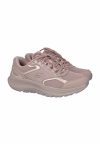 Zapatillas deportivas de color rosa claro con tejido de malla, superposiciones texturizadas y una suela acolchada. Los acentos reflectantes añaden detalle al diseño.