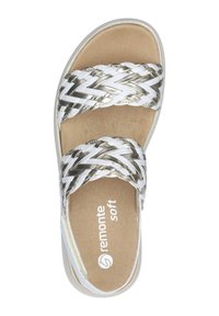 Woven strap sandals with metallic silver and white finish, soft beige footbed, open toe design, slight heel, and embossed brand name.