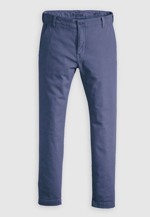 Blå bomullschinos med en slät textur, slim fit, bältesstlopp, knappgylf och uppvikta ärmar. Har en märkesetikett på midjebandet.