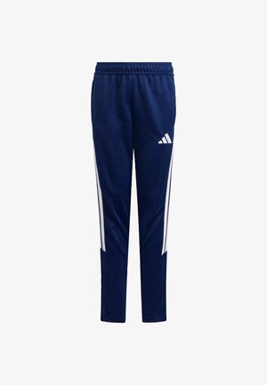 Pantalon de sport bleu marine avec des rayures blanches sur les côtés, taille élastique, jambes resserrées et un petit logo sur la cuisse gauche. Texture lisse.