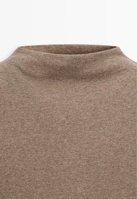Brown high-neck sweater made from a soft, stretchy material. Features a ribbed texture and a fitted design. No visible hardware or patterns.