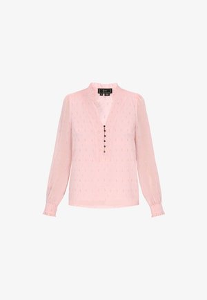 Roosa pluus pikkade varrukatega, volangikaelusega ja nööpide ridadega. Omab tekstuuriga mustrit, millel on väiksed kuld- ja hõbeaktsendid.