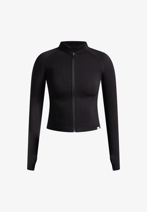 Sort cropped zip-jakke med lange ærmer, ribbet tekstur og høj krave med tommelhuller ved ærmeenden.