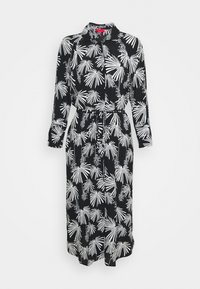 Černé šaty s bílým vzorem palmových listů, dlouhými rukávy, zapínáním na knoflíky vpředu a mašlí v pase pro přiléhavý vzhled.