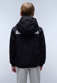 Black hooded jacket with elastic cuffs and hem, featuring a logo on the back. The material appears smooth and water-resistant.