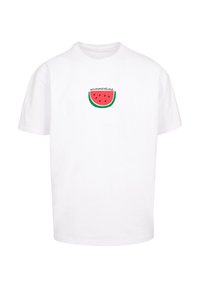 Hvid bomulds T-shirt med et grønt og rødt vandmelon grafik med ordet "sommer" over det. Korte ærmer, afslappet pasform.