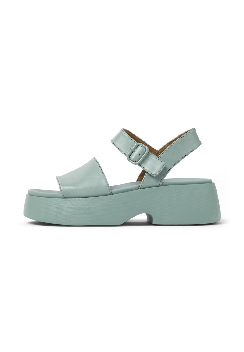 Aqua leather sandal with an open toe, adjustable buckle strap, and a chunky platform sole for added height and stability.