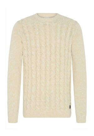 Kootud särk heledas beežis, millel on nööride muster. Omab ümarat kaelust ning soonikkoes mansette ja allserva. Pehme tekstuur.