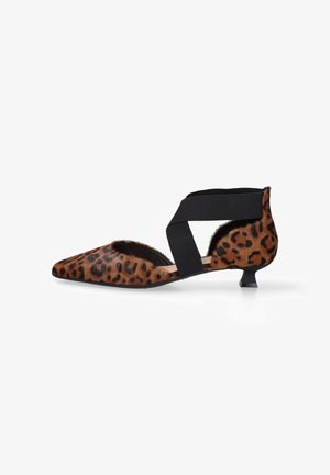 Leopard print kitten heel shoe with black elastic crisscross straps and pointed toe, side view on white background.